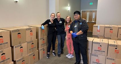 Oroville Hospital staff preparing thanksgiving meal boxes
